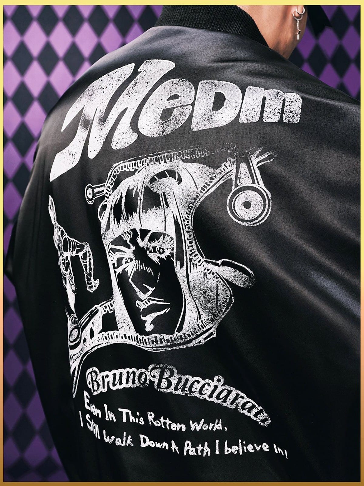 MEDM JoJo Collab Graphic Puffer Bomber in Black - On Model