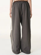 BLINDNOPLAN Contrast Panel Pleated Parachute Pants in Gray - On Model