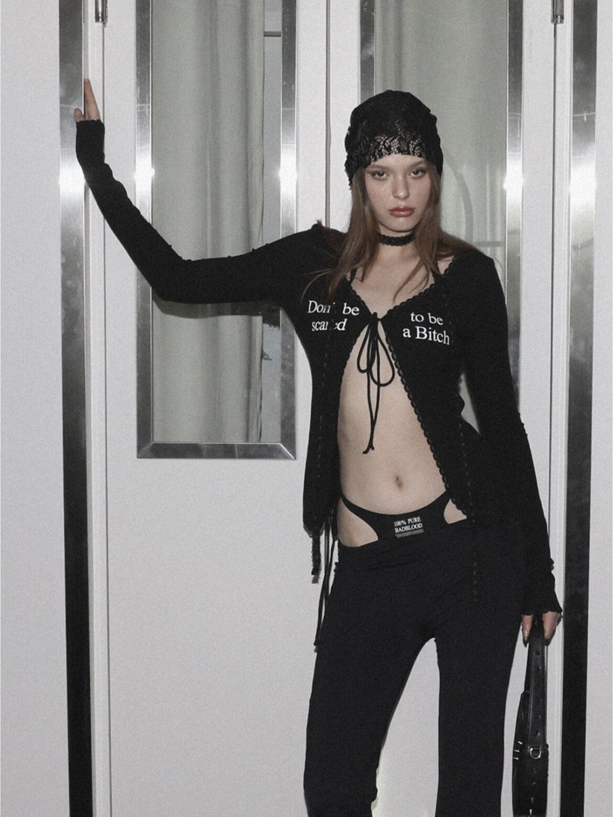 BADSEED Lace Trim Tie Front Cardigan in Black - On Female Model