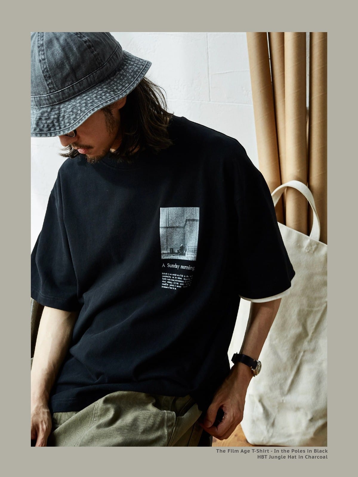 USAGE Air Spun Cotton Graphic T Shirt in Black - On Male Model