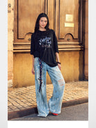 BeerBro Distressed Dirty Wash Relaxed Jeans in Blue - On Female Model