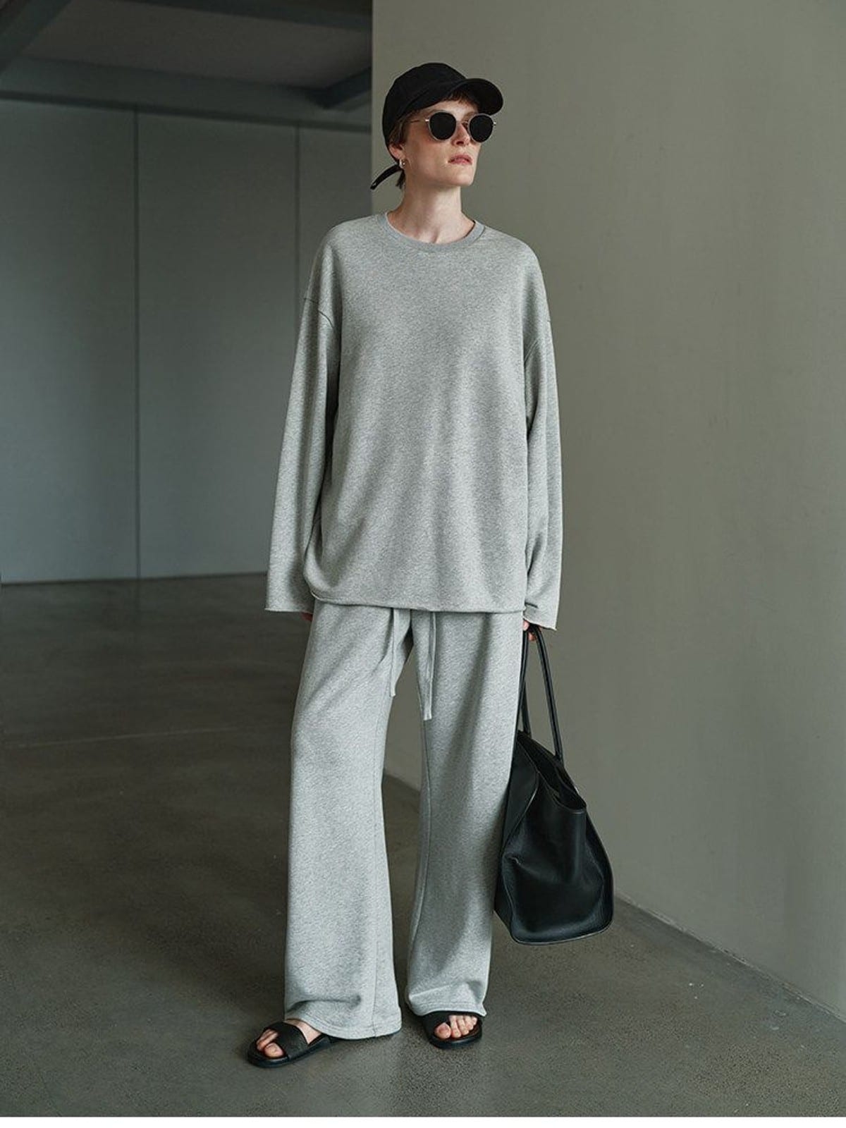 MSBEAST Cotton Terry Sweatshirt Tapered Joggers in Gray - On Female Model