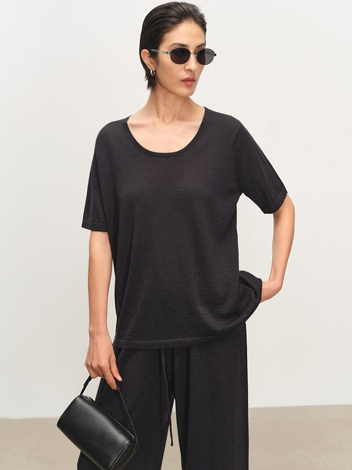 MSBEAST Melange Wool Linen Scoop Neck T Shirt in Black - On Female Model