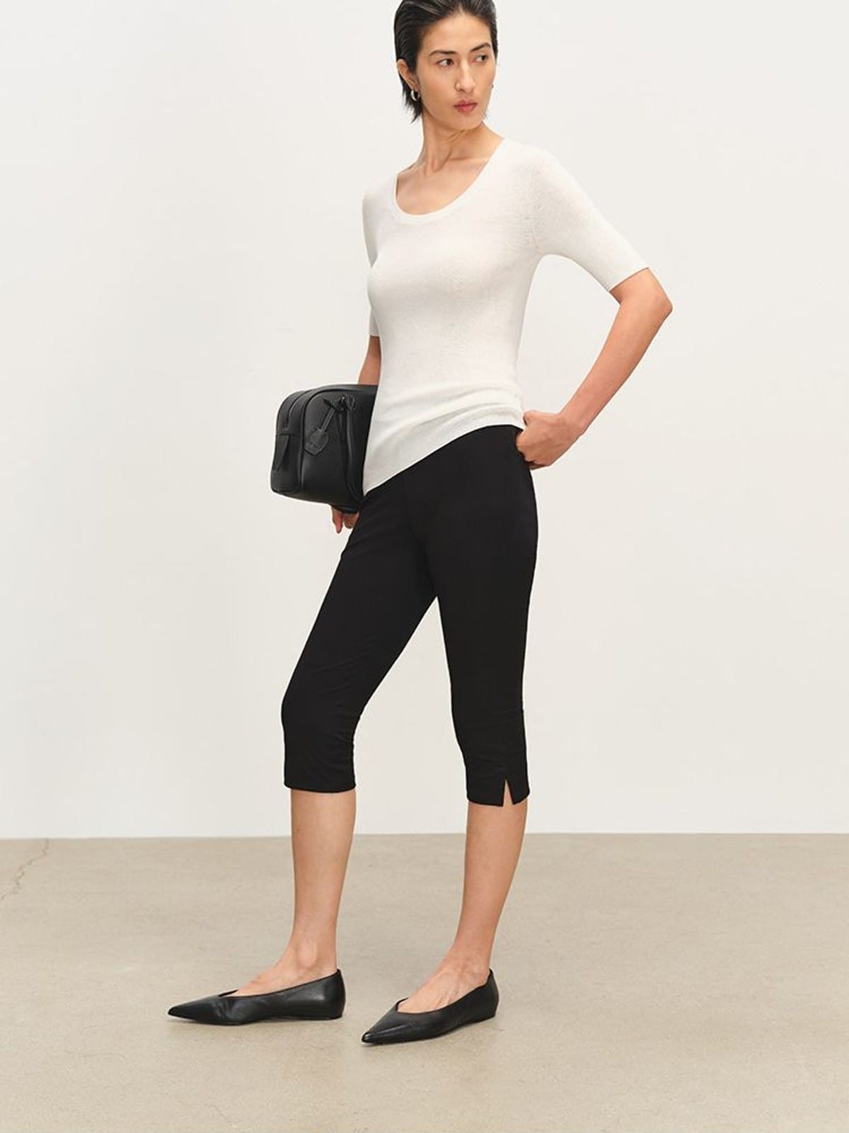 MSBEAST Viscose Blend Capri Leggings in Black - On Female Model
