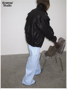 ACSENSE STUDIO Triangle Cut Sheepskin Jacket in Black - On Model