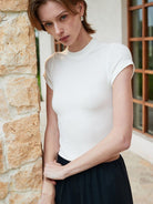 MSBEAST Acetate Modal Cap Sleeve Cropped T Shirt in White - On Female Model