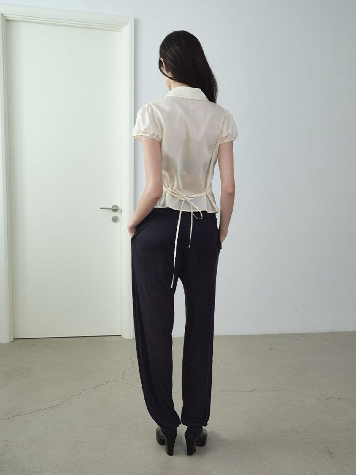 RARELY ALIKE Peter Pan Collar Tie Front Shirt in Cream - On Female Model