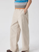 SIMPLE PROJECT Cotton Straight Leg Chino Trousers in Beige - On Male Model