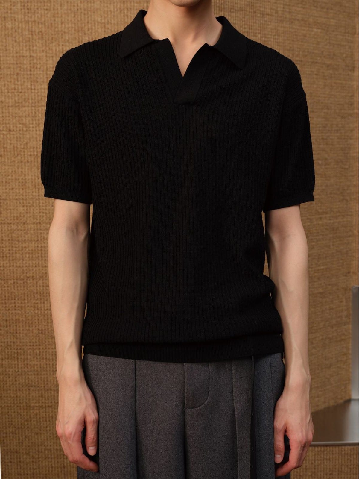 JCAESAR STUDIO Ribbed Ice Silk Knit Polo in Black - On Male Model