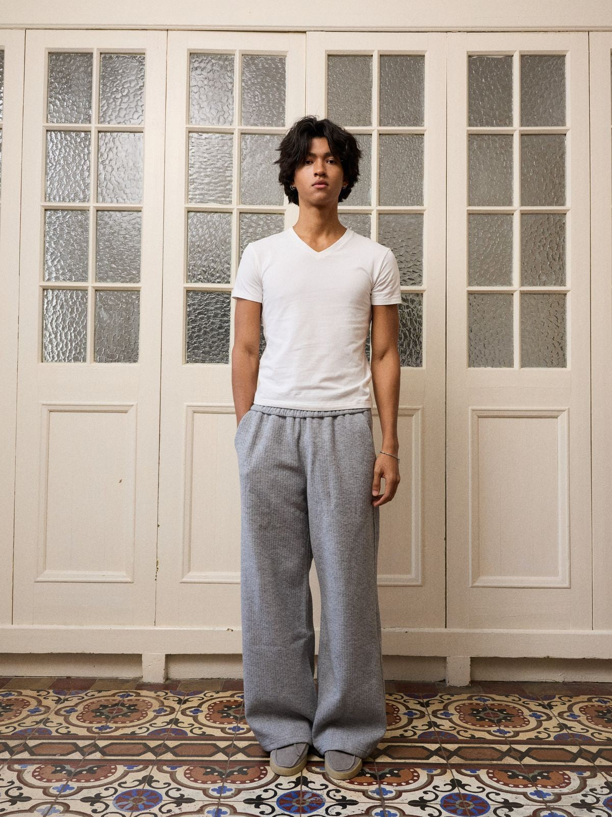 Retro 21 Anti Wrinkle V Neck T Shirt in White - On Male Model