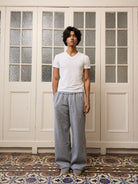 Retro 21 Anti Wrinkle V Neck T Shirt in White - On Male Model