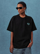 MEDM Letter Embroidery Cotton T Shirt in Black - On Male Model