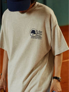 USAGE Retro Tennis Graphic Cotton T Shirt in Gray - On Male Model