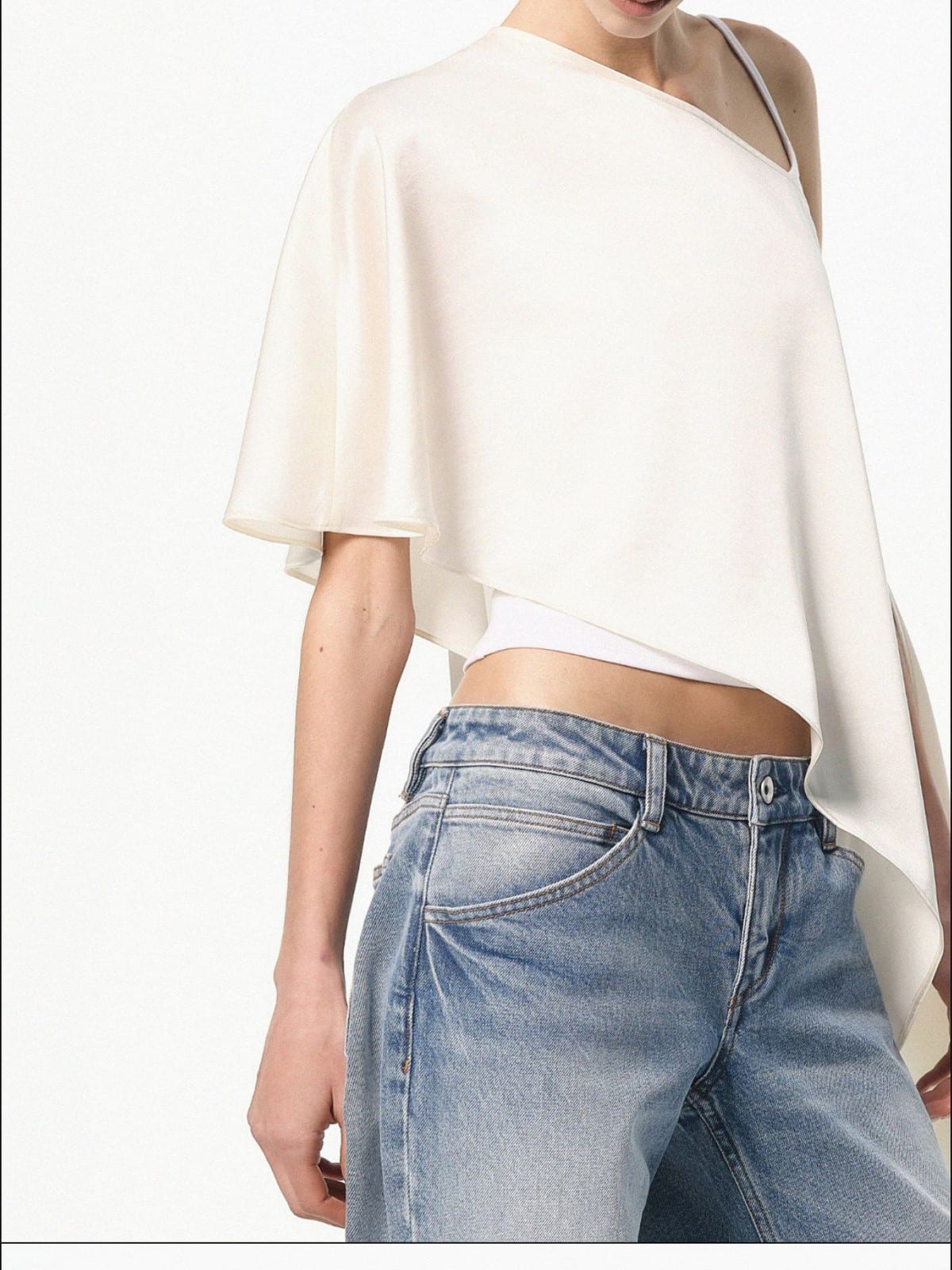 RARELY ALIKE Asymmetrical Satin One Shoulder Blouse in White - On Female Model