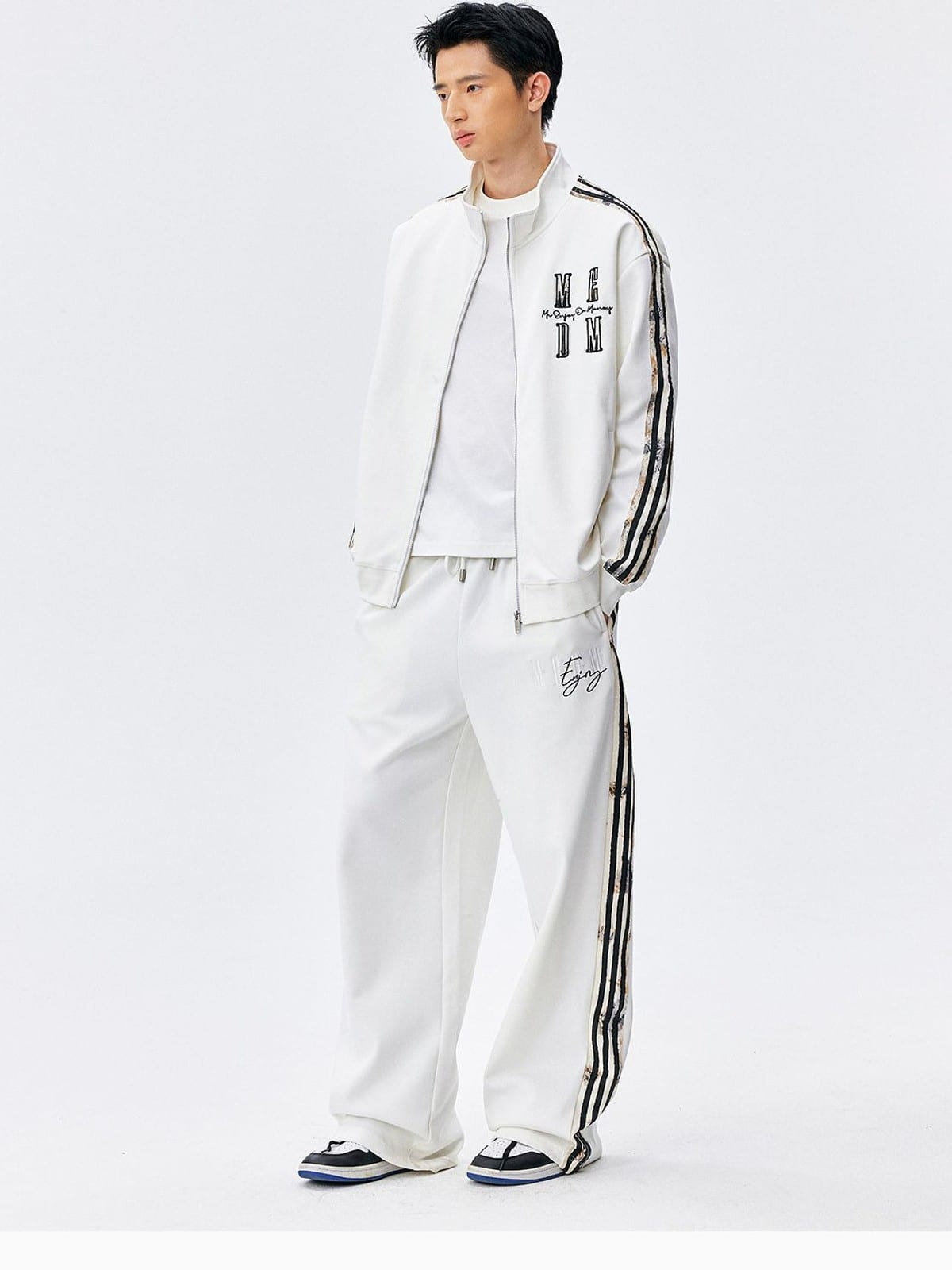 MEDM Lace Paneled Striped Track Pants in White - On Male Model