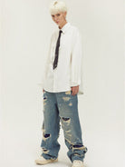 LOSTCTRL Heavy Distressed Double Layer Jeans in Blue - On Model