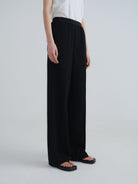Random Piece Merino Wool Straight Leg Trousers in Black - On Model