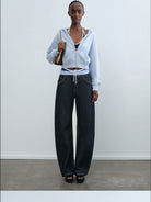 RARELY ALIKE Graphic Cropped Zip Up Hoodie in Sky Blue - On Female Model