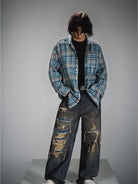 LOSTCTRL Frayed Asymmetric Plaid Shirt in Blue - On Male Model
