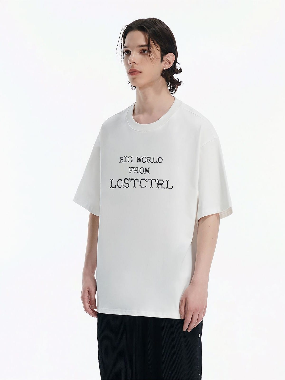 LOSTCTRL Cross Stitch Letter T Shirt in White - On Male Model