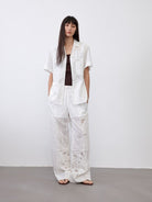 Random Piece Embroidered Cutout Wide Leg Pants in White - On Female Model