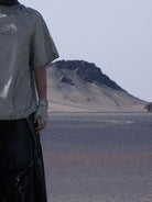 PERSONSOUL Deconstructed Distressed Cotton T Shirt in Gray - On Male Model