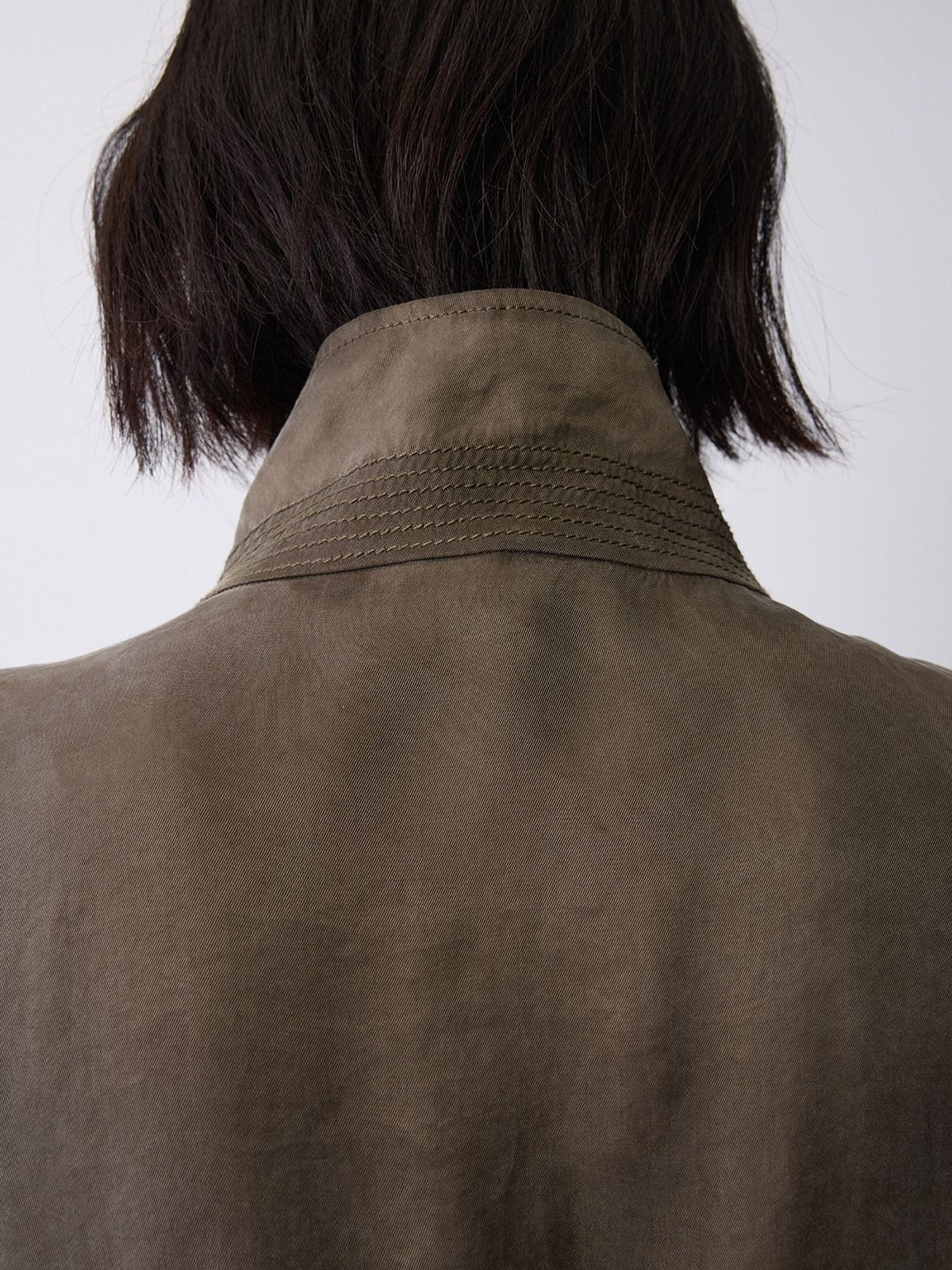 Random Piece Washed Stand Collar Peplum Jacket in Olive - On Model