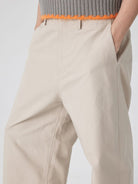 SIMPLE PROJECT Cotton Straight Leg Chino Trousers in Beige - On Model
