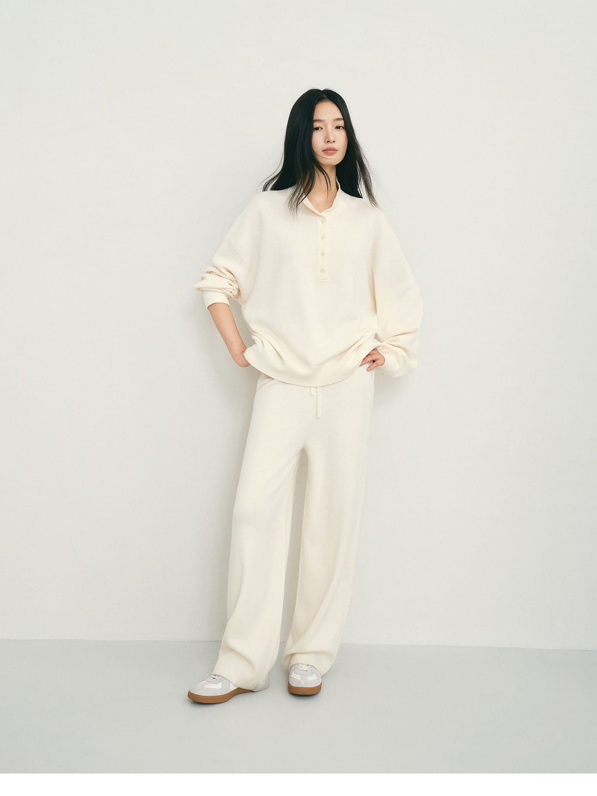 TEASEL Worsted Wool Henley Sweatshirt in Cream - On Female Model