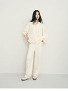 TEASEL Worsted Wool Henley Sweatshirt in Cream - On Female Model