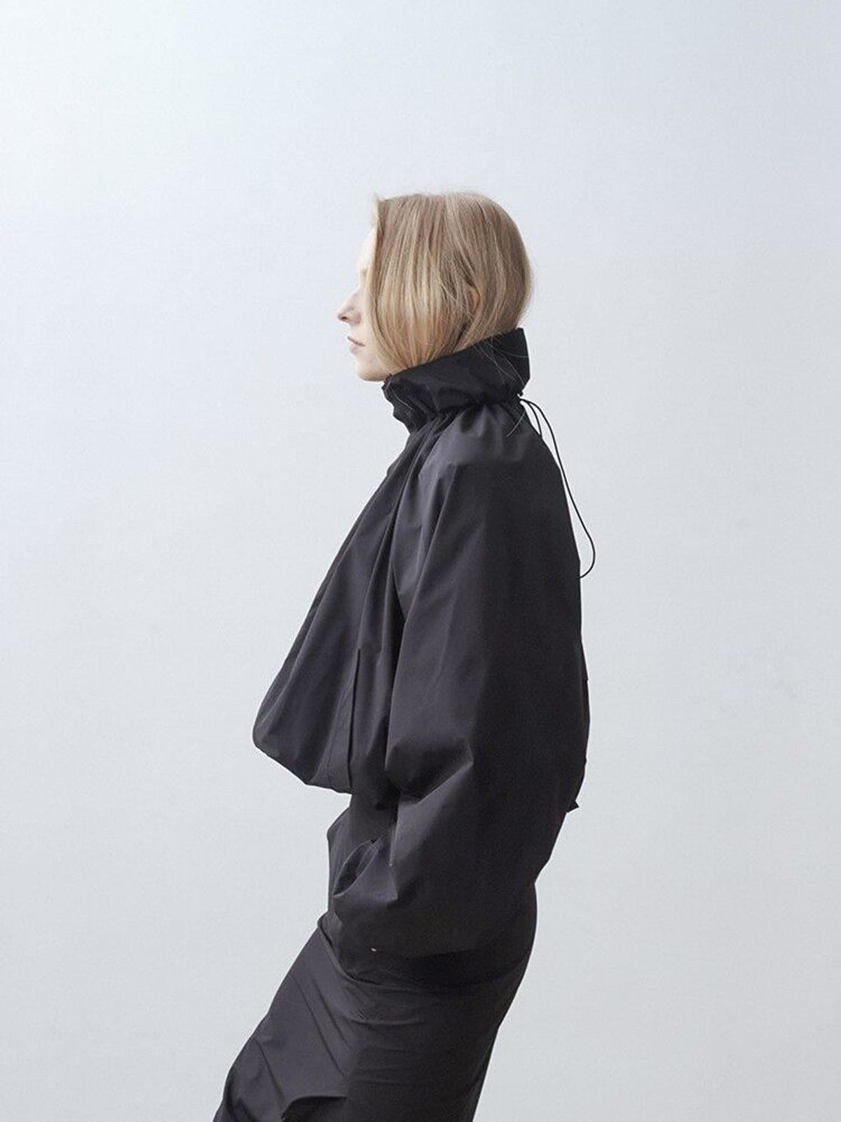 RARELY ALIKE Adjustable Collar Balloon Sports Jacket in Black - On Female Model