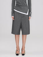 RARELY ALIKE Tailored Bermuda Shorts in Gray - On Female Model