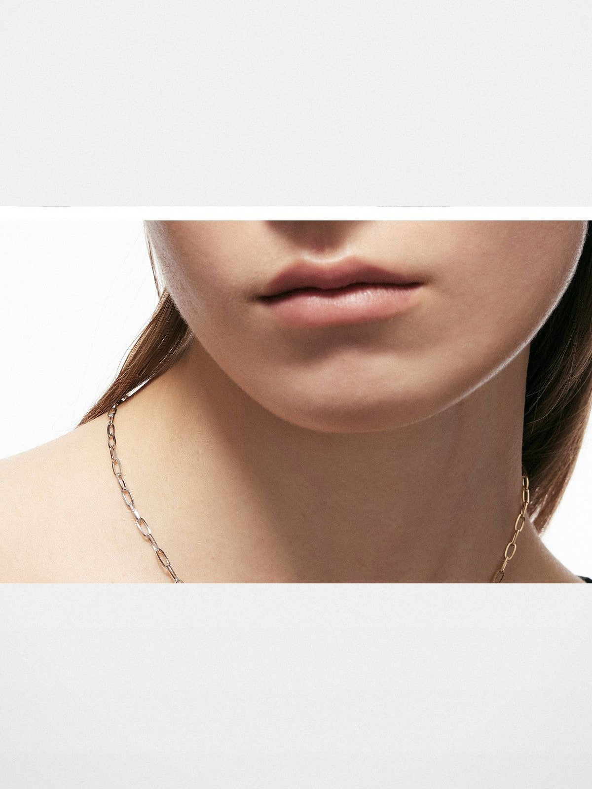 BLACKHEAD Two Tone Twisted Nail Steel Necklace in Gold - On Female Model