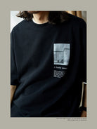 USAGE Air Spun Cotton Graphic T Shirt in Black - On Male Model