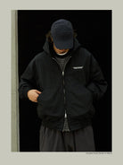 USAGE Crinkle Nylon Hooded Track Jacket in Black - On Male Model