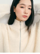 TEASEL Merino Wool Boucl Zip Cardigan in White - On Female Model