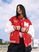 MEDM Pearl Embellished Varsity Jacket in Burgundy - On Female Model