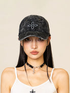 SMFK Distressed Cross Embroidered Baseball Cap in Black - On Female Model