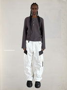 UNKNOWNWORLD Distressed Cotton Waffle Henley in Dark Gray - On Female Model