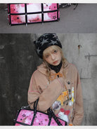 CFIERCE Spiked Cat Print Cage Bag in Red - On Female Model