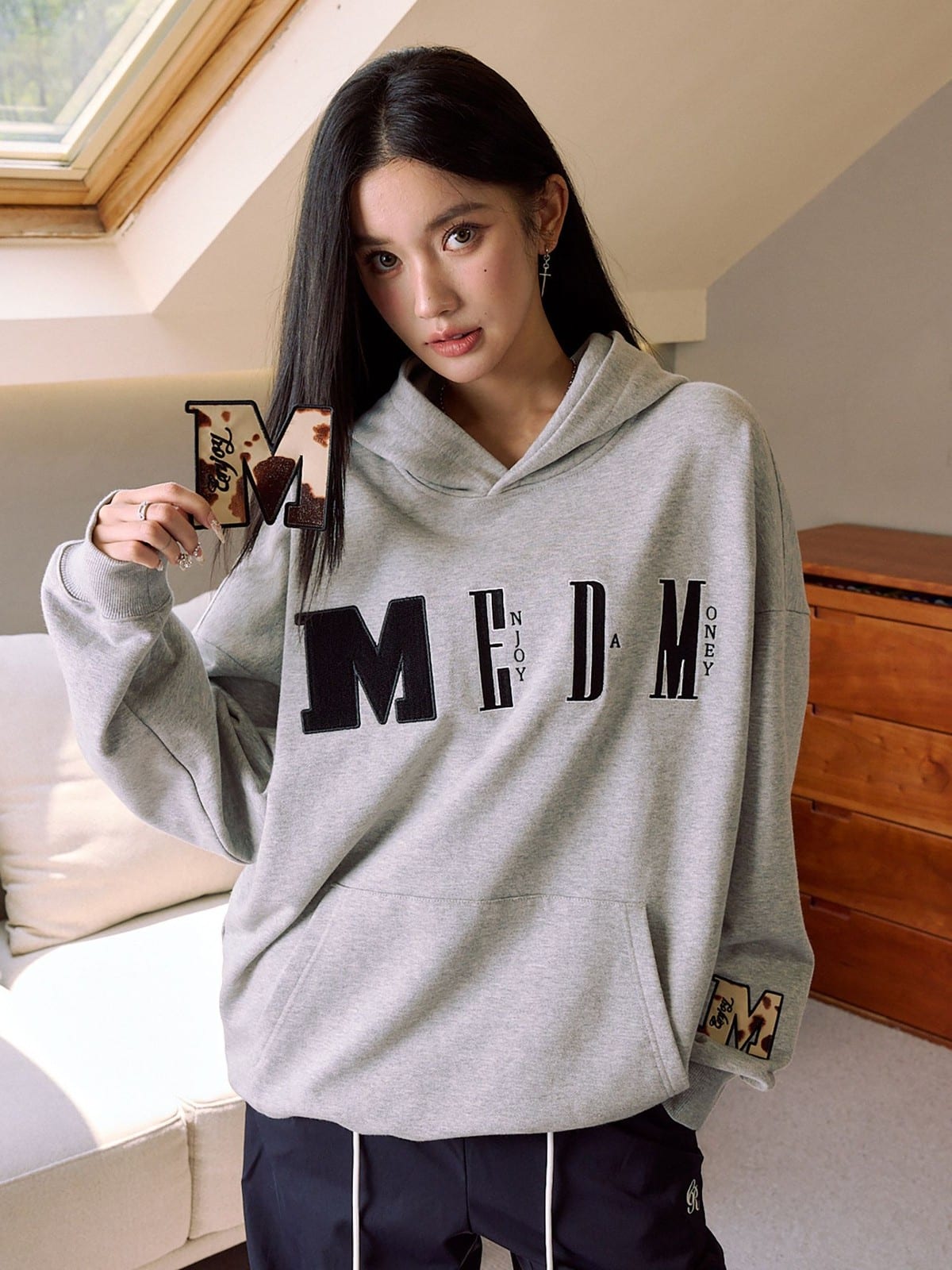 MEDM Animal Print Logo Pullover Hoodie in Gray - On Female Model