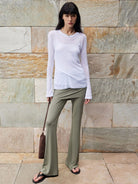 MADEINAM Fold Over Waist Flared Stretch Pants in Olive - On Female Model