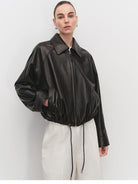 MSBEAST Cropped Leather Drawstring Jacket in Black - On Female Model