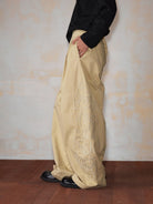 MEDM Embroidered Cotton Cargo Pants in Beige - On Model