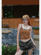 BeerBro Distressed Raw Hem Denim Shorts in Denim - On Female Model
