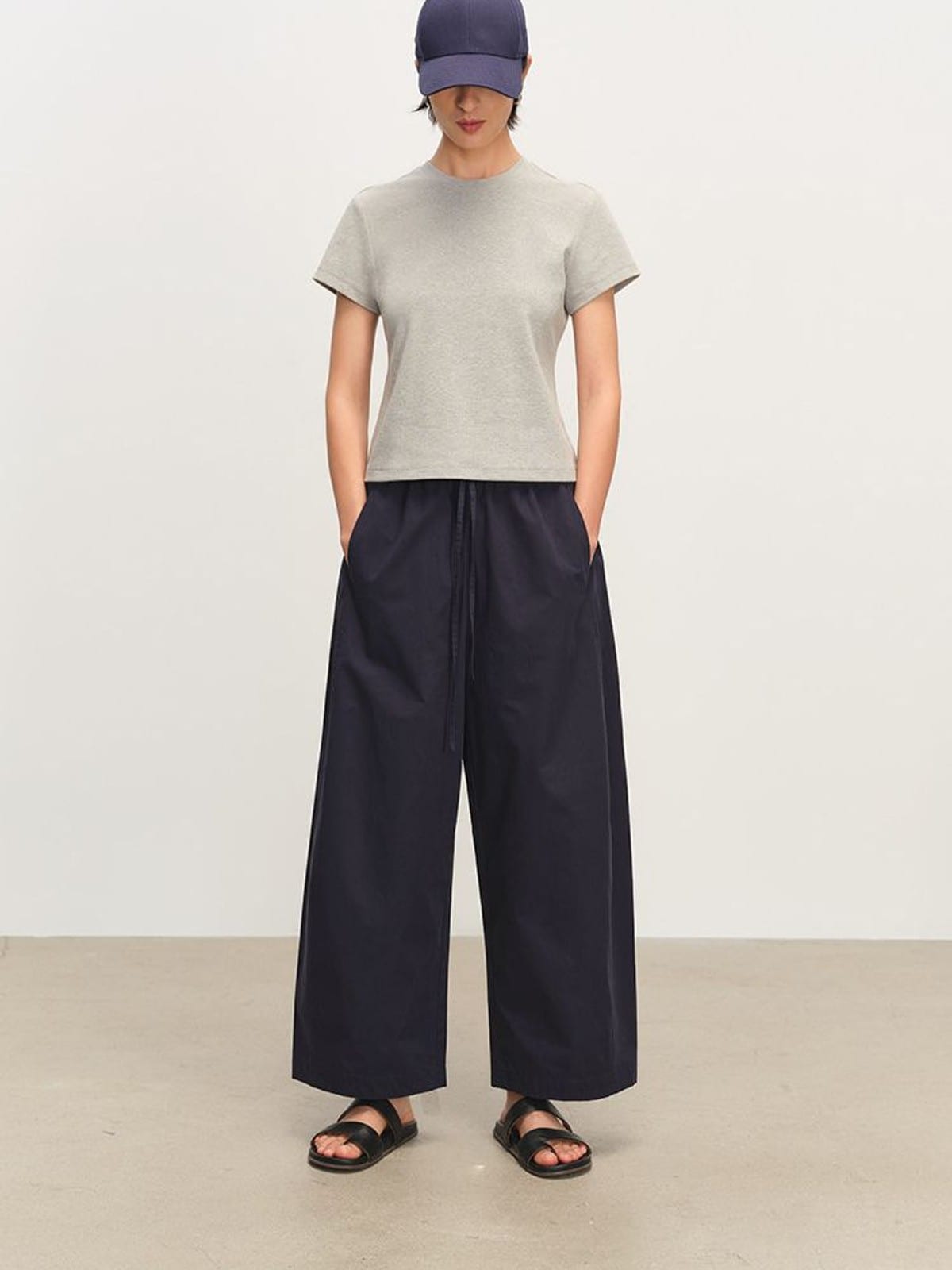 MSBEAST Paper Texture Cotton Balloon Pants in Navy Blue - On Female Model