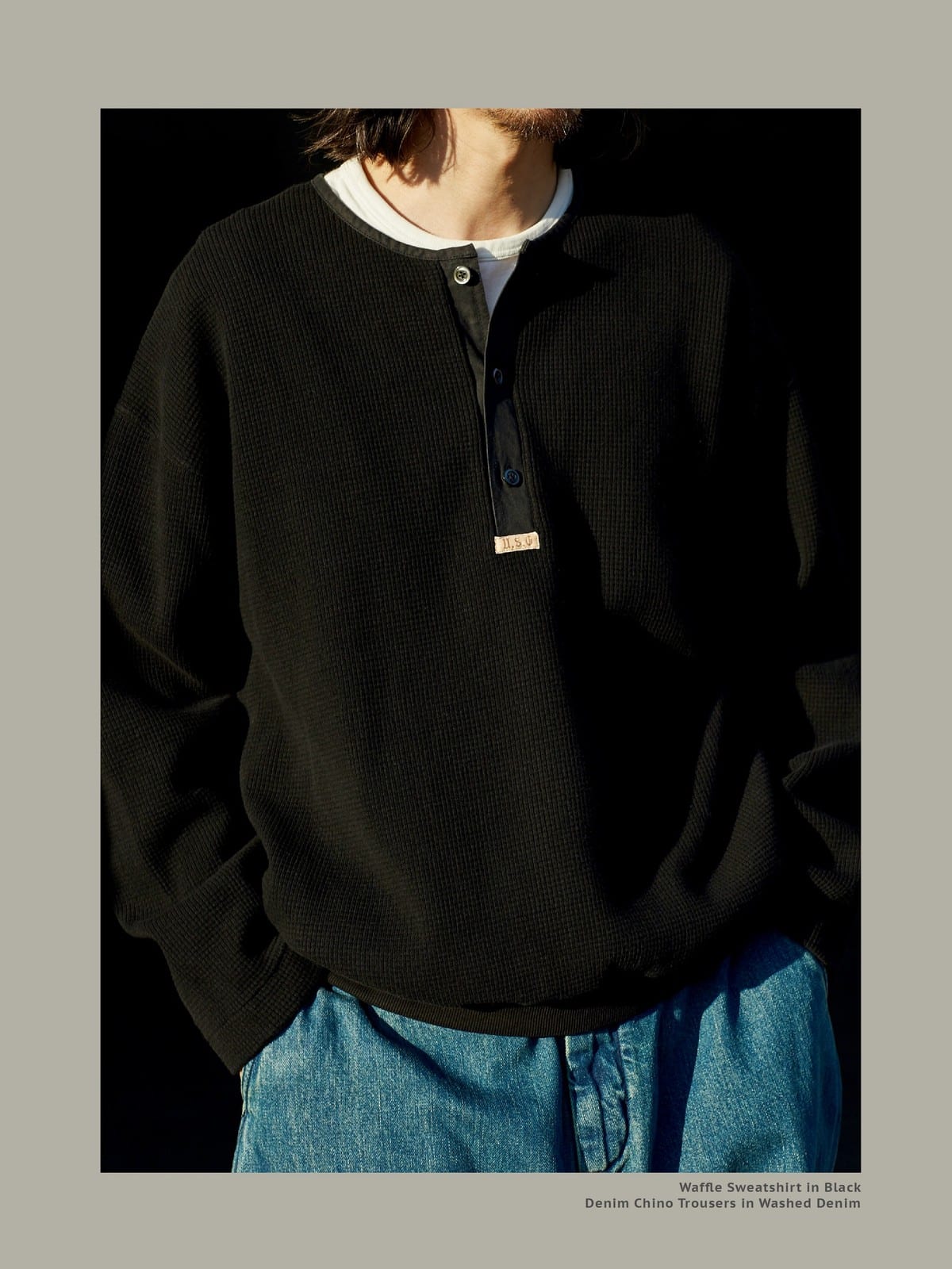 USAGE Heavyweight Waffle Knit Henley Sweatshirt in Black - On Male Model