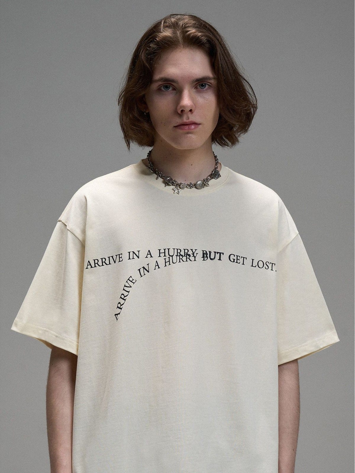 LOSTCTRL Heavyweight Letter Print T Shirt in Cream - On Male Model