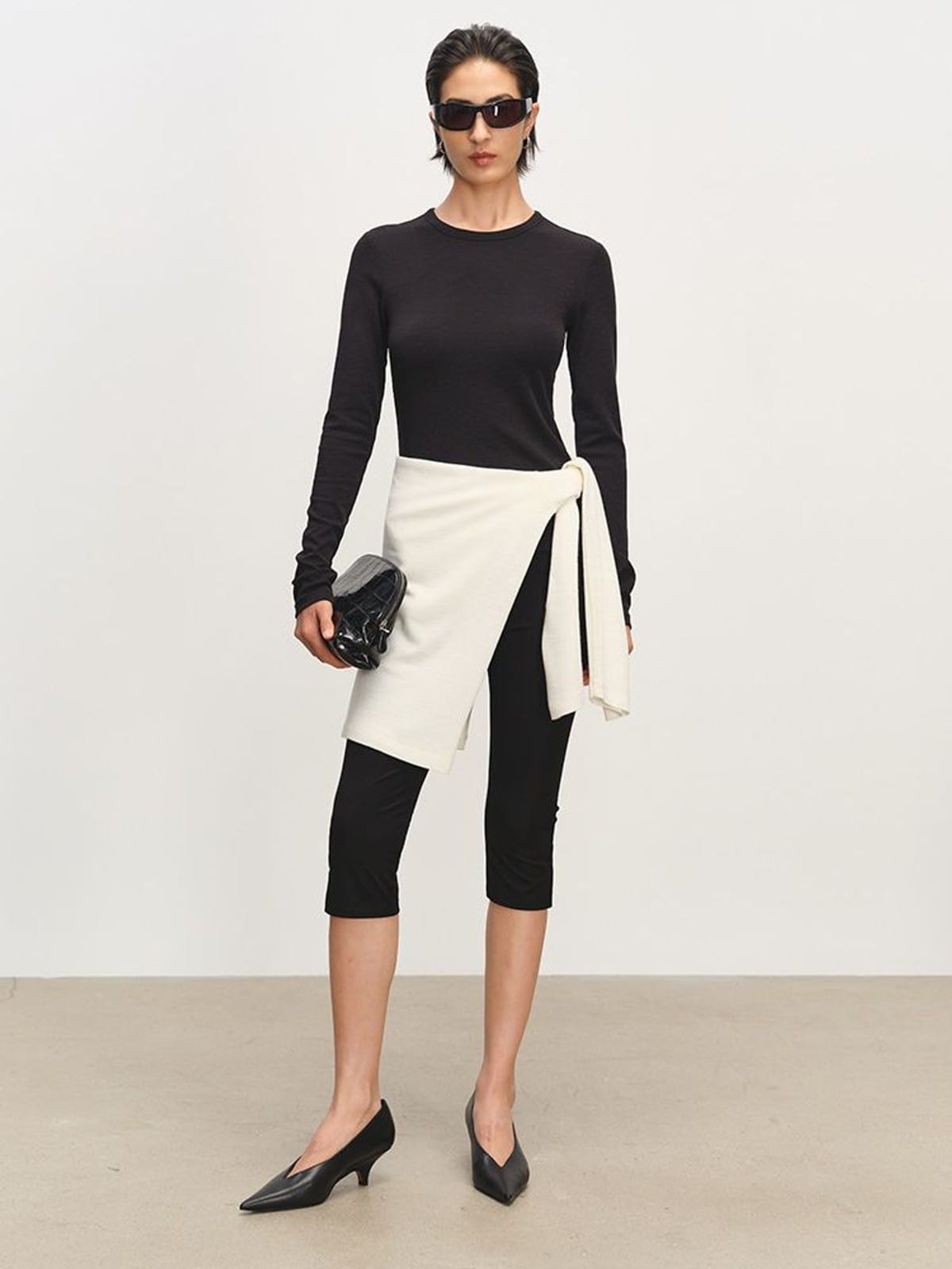 MSBEAST Viscose Blend Capri Leggings in Black - On Female Model