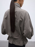 Random Piece Washed Cotton Drawstring Jacket in Beige - On Female Model